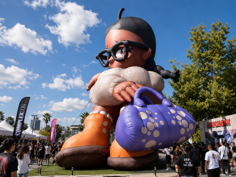 Giant inflatable character displayed at an outdoor public event