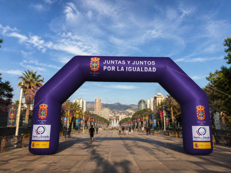 Purple inflatable equality arch displayed at a public awareness event