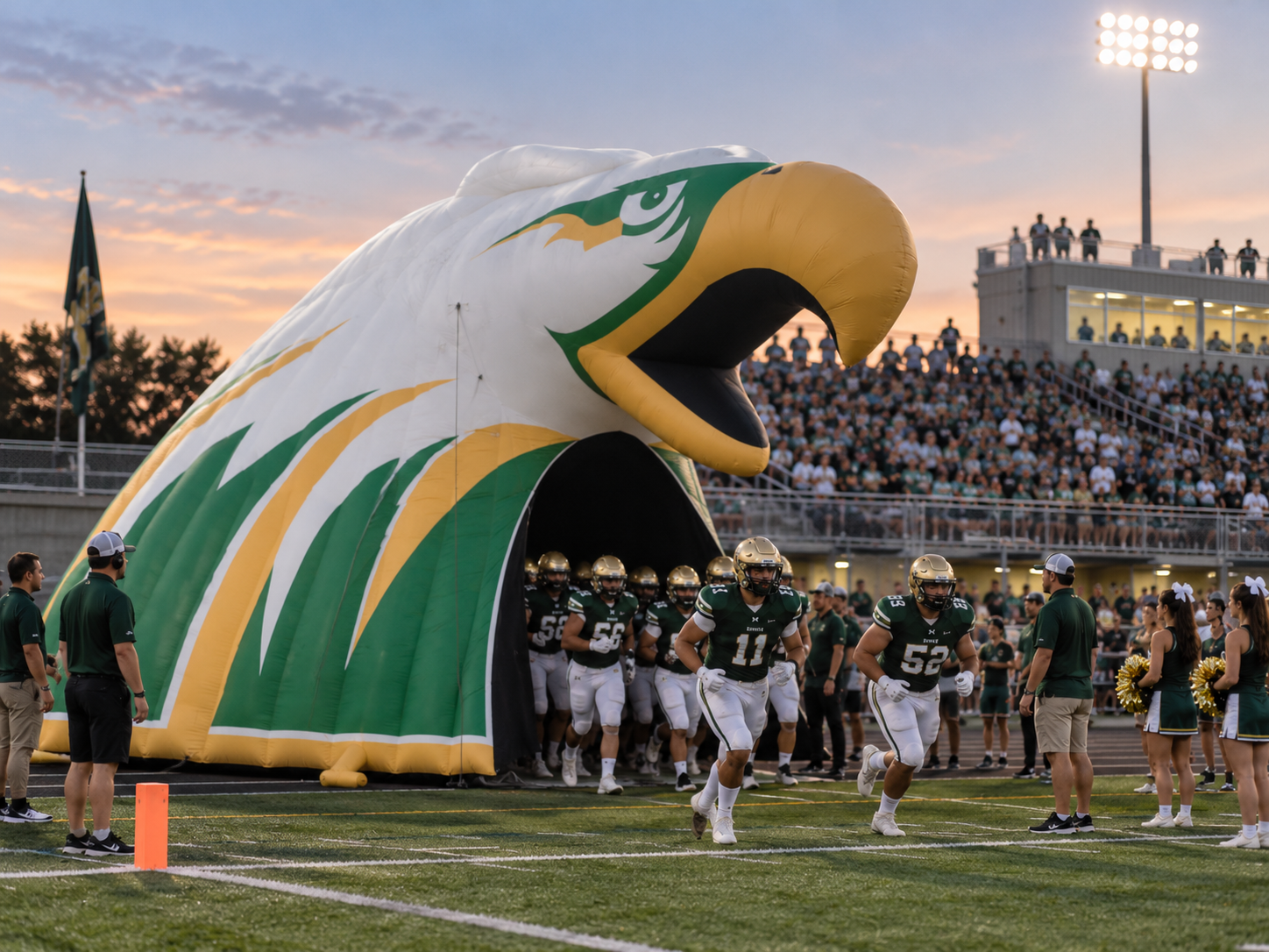 Large inflatable eagle mascot tunnel used as a team entrance at a sports event