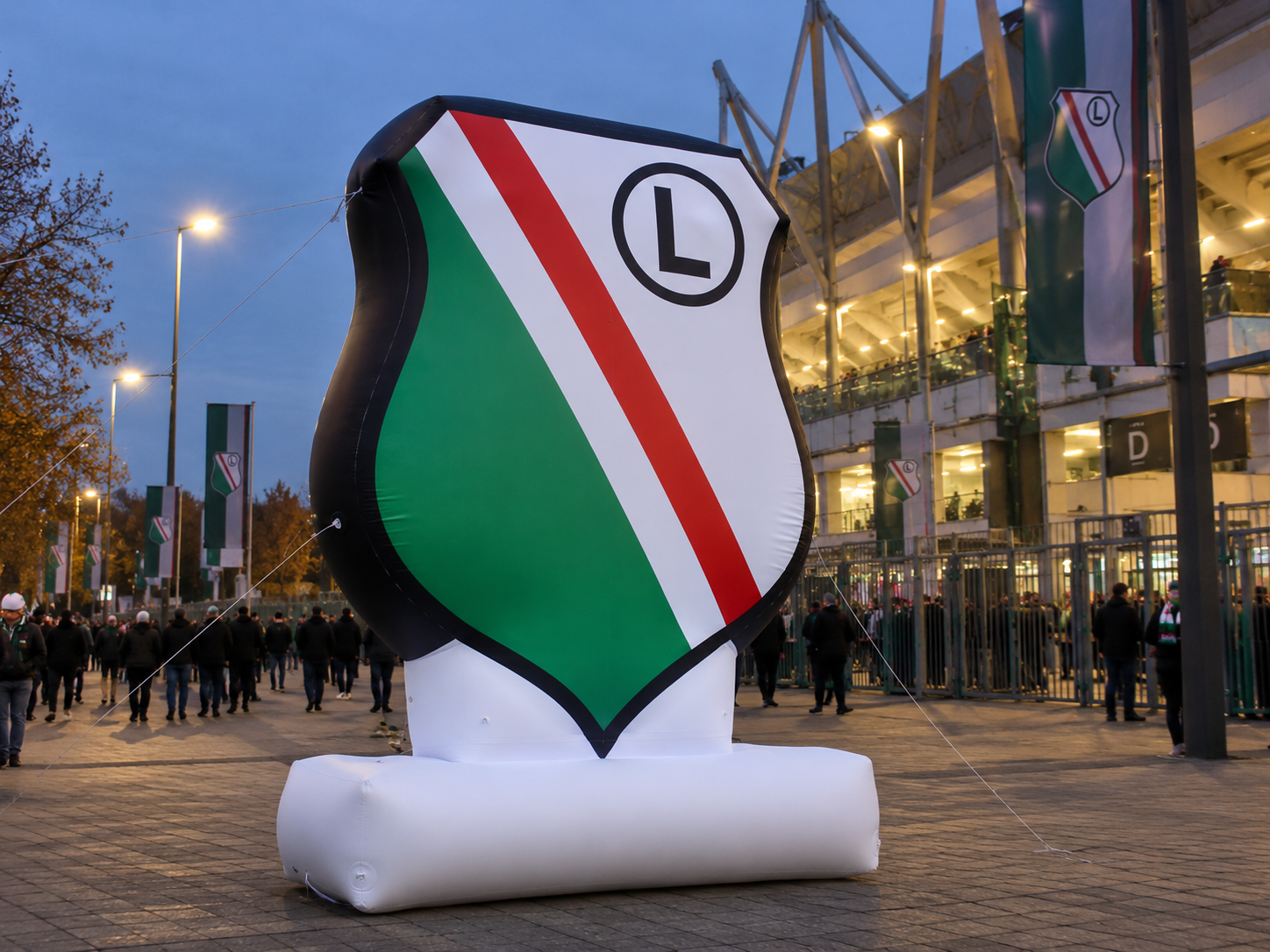 Giant inflatable Legia Warszawa crest displayed outside the stadium during a football event