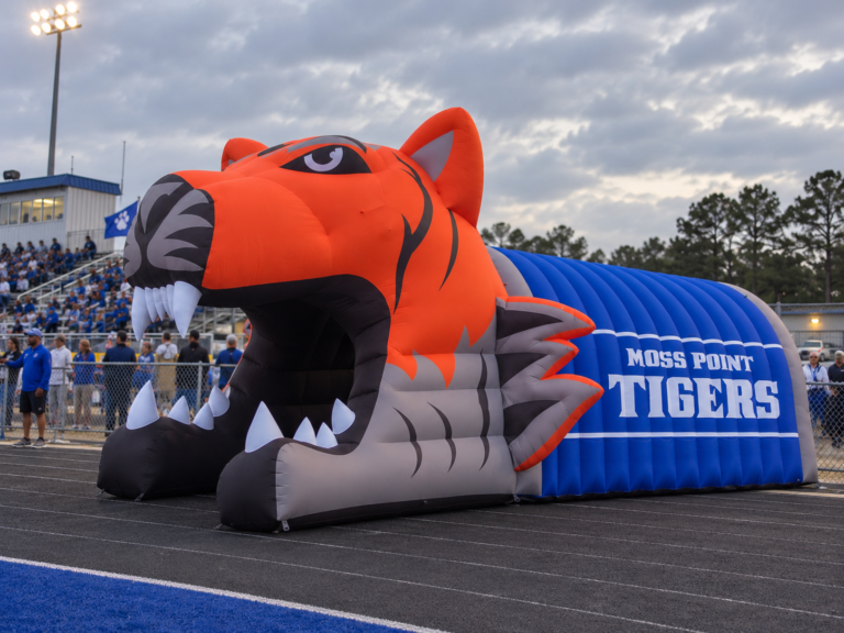 Giant inflatable tiger mascot tunnel designed for school sports events and team entrances